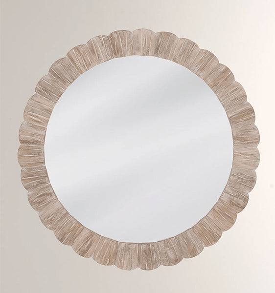 A round bone inlay wall mirror with a bleached finish