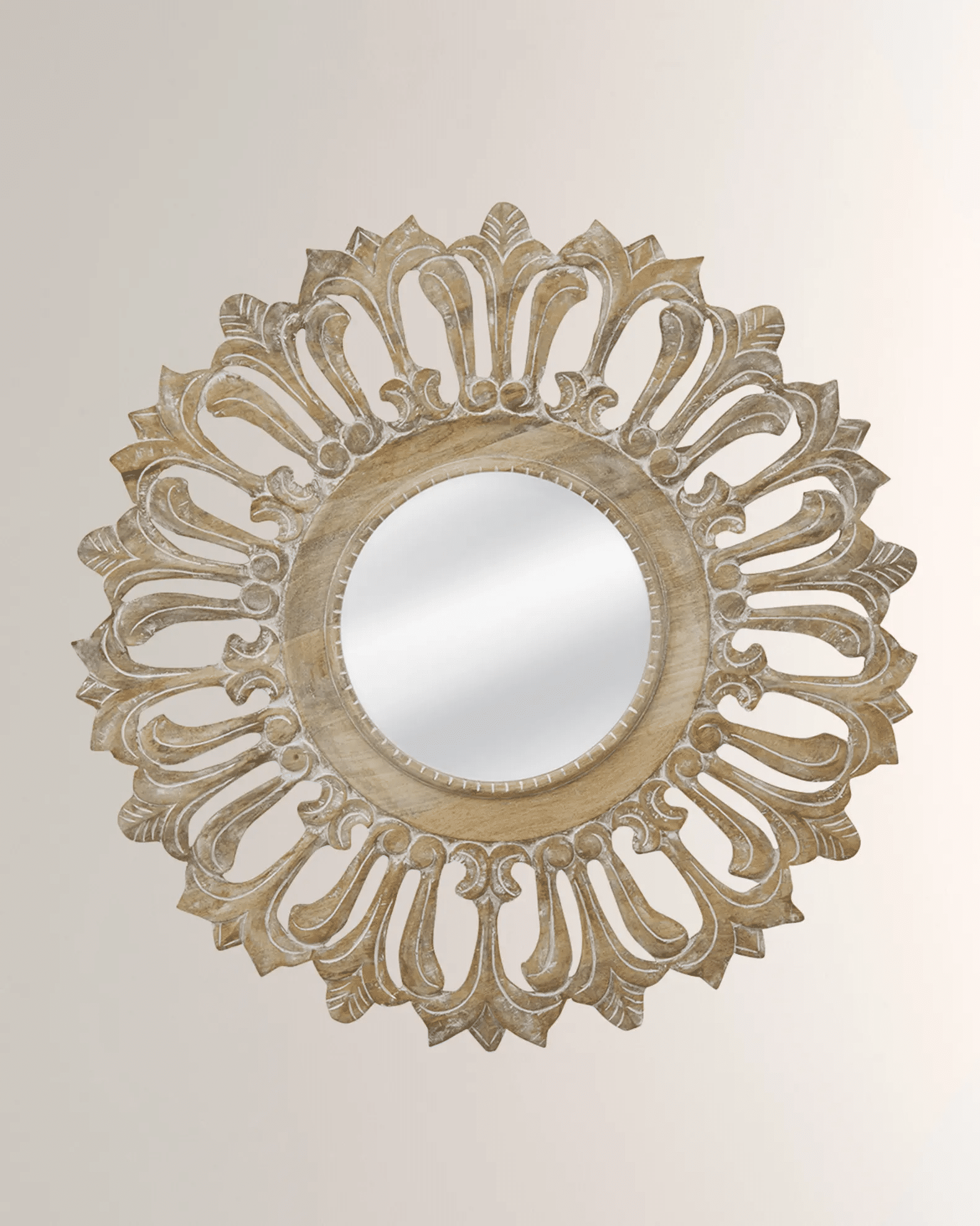 A handcarved bone inlay mirror wall mirror with a bleached finish, featuring intricate carvings and a mirrored center.